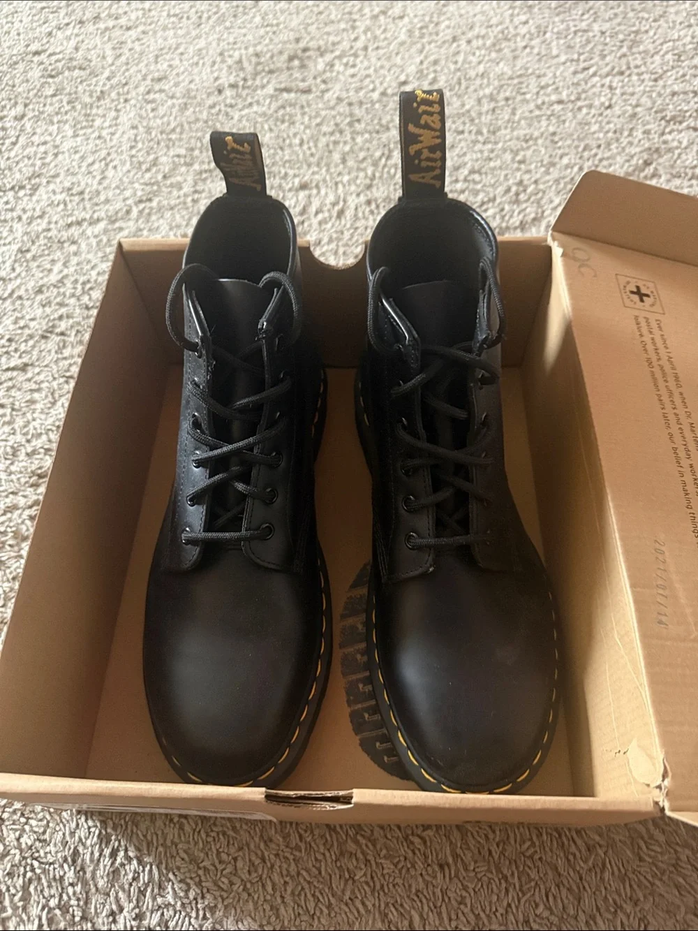 Dr. Martens Black Leather 8-Eye Lace-Up Boots with Yellow Stitching